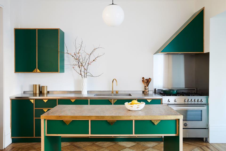 A marbled linoleum countertop makes for a homey, not-overly-renovated vibe in this townhouse.