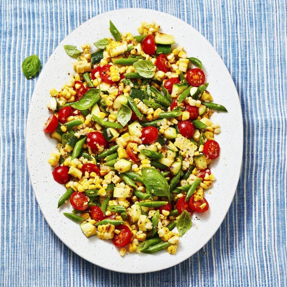 <p>Get in all of your favorite summer veggies with this succotash loaded with corn, zucchini, tomatoes and green beans. </p><p>Get the <strong><a href="https://www.goodhousekeeping.com/food-recipes/a36719482/succotash-recipe/" rel="nofollow noopener" target="_blank" data-ylk="slk:Succotash recipe;elm:context_link;itc:0;sec:content-canvas" class="link ">Succotash recipe</a></strong>. </p><p><strong>RELATED: </strong><a href="https://www.goodhousekeeping.com/food-recipes/g2595/fresh-corn-recipes/" rel="nofollow noopener" target="_blank" data-ylk="slk:48 Creative Corn Recipes to Make All Summer Long;elm:context_link;itc:0;sec:content-canvas" class="link ">48 Creative Corn Recipes to Make All Summer Long</a></p>