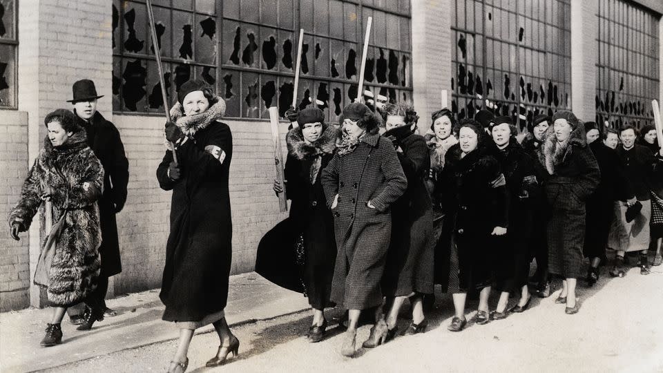 A march of strikers' wives  following the riot between strikers and policemen on February 1, 1937, in Flint. - Bettmann/Bettmann/Bettmann Archive