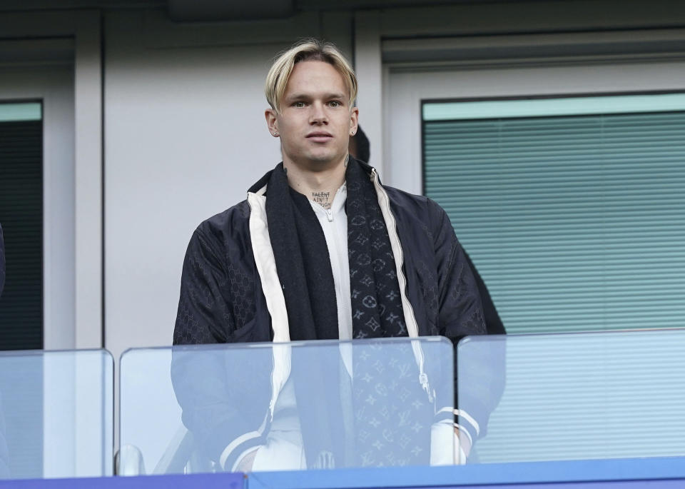 Chelsea new signing Mykhailo Mudryk looks on in the stands ahead of the English Premier League soccer match between Crystal Palace and Chelsea at Stamford Bridge in London, Sunday Jan. 15, 2023. Ukraine winger Mykhailo Mudryk became the latest big-money signing for Chelsea under the club's new American ownership, joining from Shakhtar Donetsk in a deal reportedly worth up to 100 million euros ($108 million) on Sunday. (Mike Egerton/PA via AP)