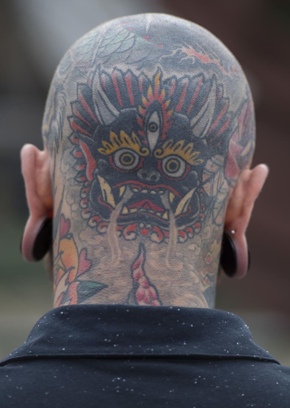 <p>A man’s tattooed head at the London Tattoo convention at Tobacco Dock on Sept. 23, 2017 in London, England. (Photo: James D. Morgan/Getty Images) </p>