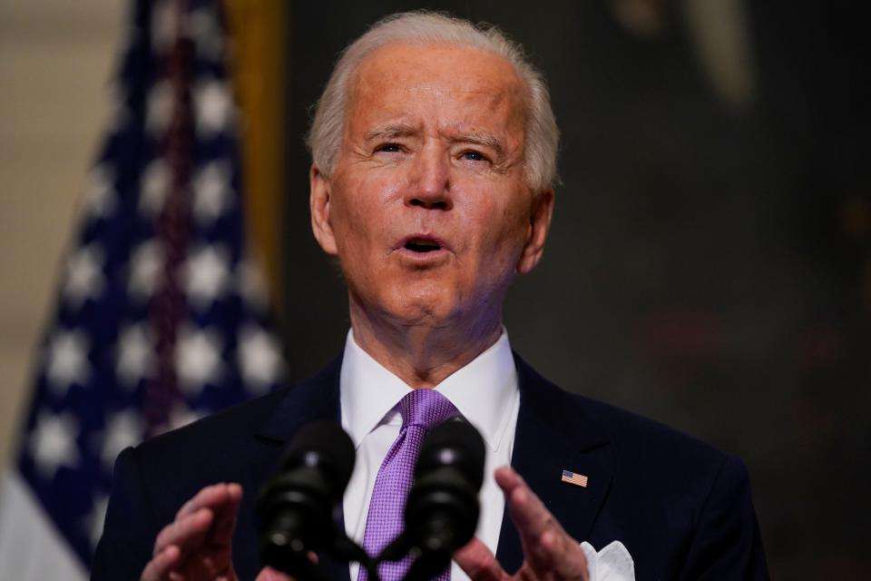 President Joe Biden delivers remarks on COVID-19, in the State Dining Room of the White House, Tuesday, Jan. 26, 2021, in Washington.