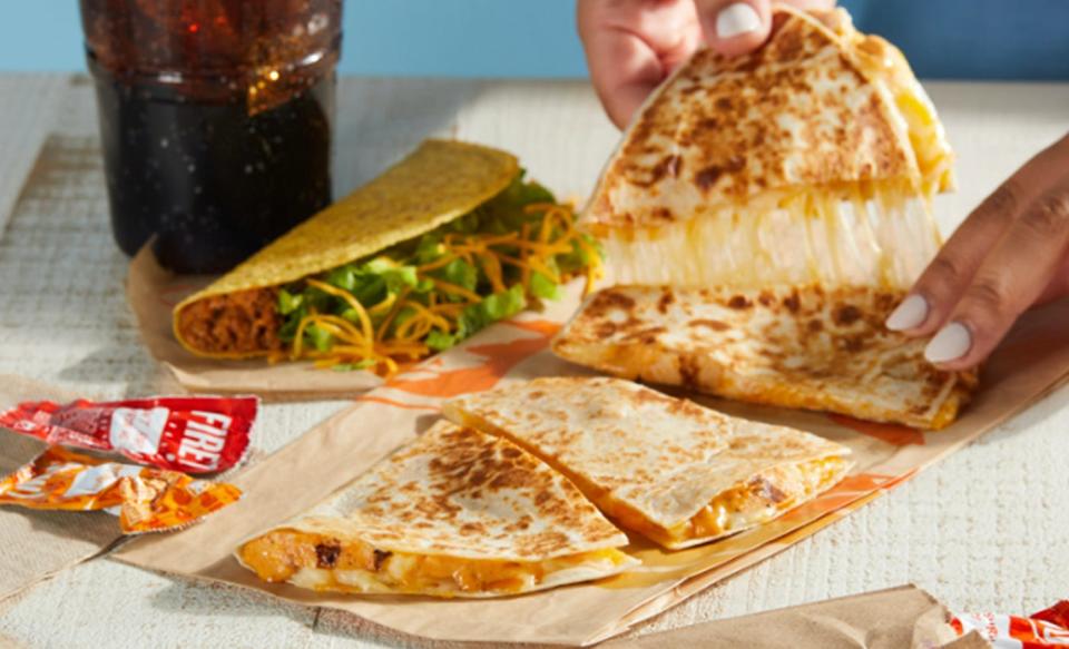 Taco Bell's Chicken Quesadilla Combo ($8.89, prices may vary slightly) includes quesadilla, crunchy taco, and a fountain drink.