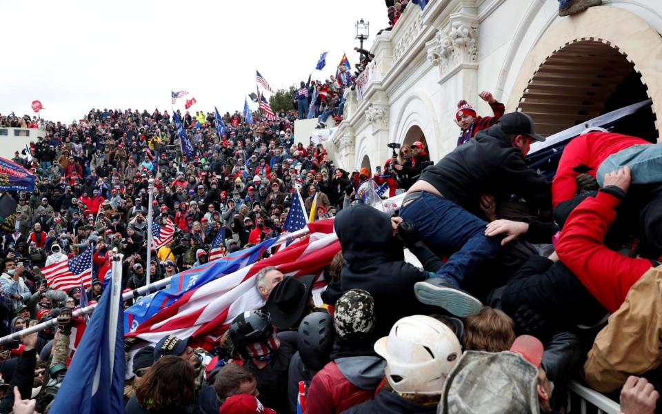 Pro-Trump protesters storm into the U.S. Capitol during clashes with polic - Shannon Stapleton/Reuters