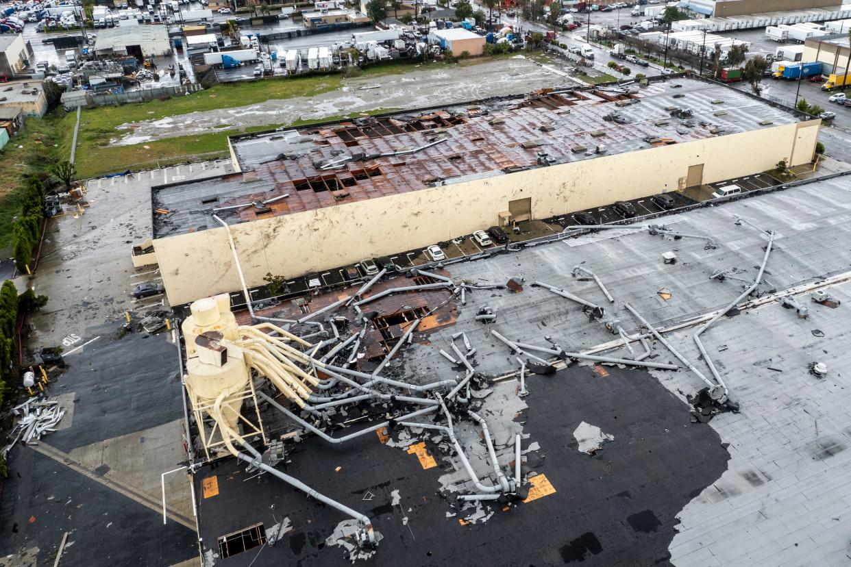 Damage to a building is seen on Wednesday, March 22, 2023 in Montebello, Calif., after a possible tornado.