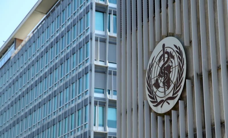 A logo is pictured on the headquarters of the WHO in Geneva