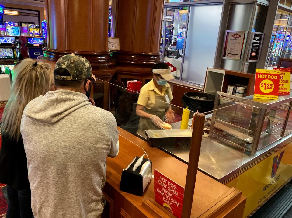 At the hot dog cart inside the South Point casino, Las Vegas gamblers can buy up to three hot dogs for $1.25 a piece.