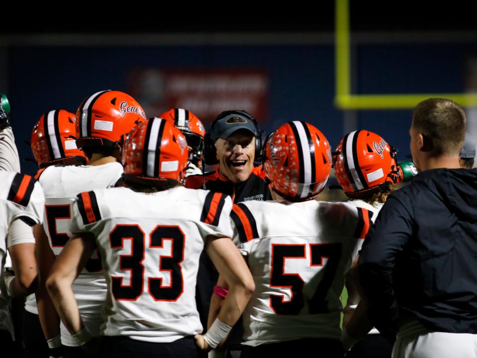 Ridgewood head coach John Slusser talks to his defense after a third-quarter touchdown against Indian Valley on Friday night in Gnadenhutten. The Braves scored four first-half touchdowns in a 35-12 win.