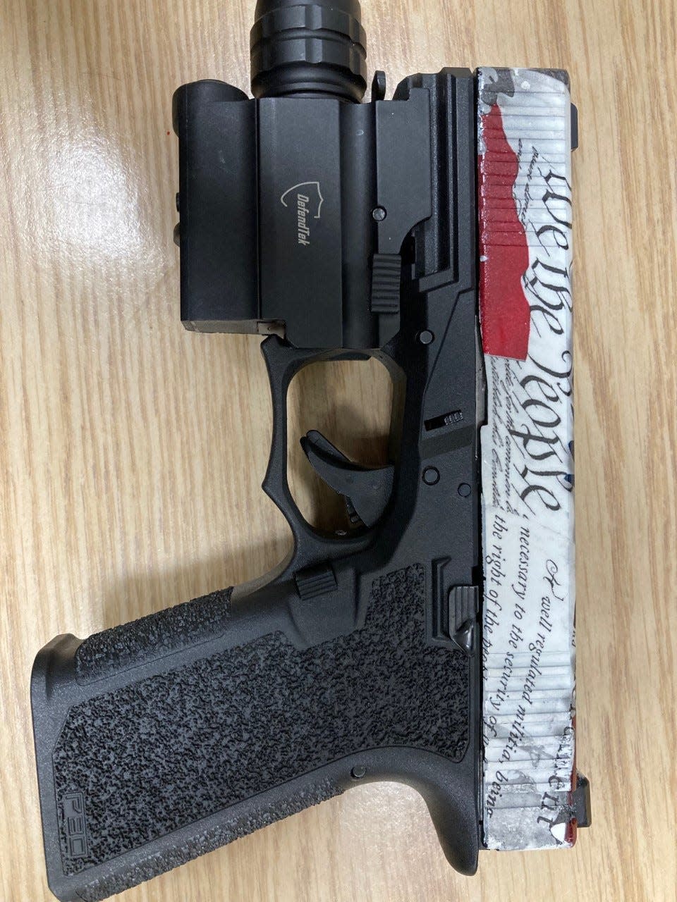 Police believe this gun, confiscated along with drugs during a traffic stop last week, is an unregistered, untraceable "ghost gun."