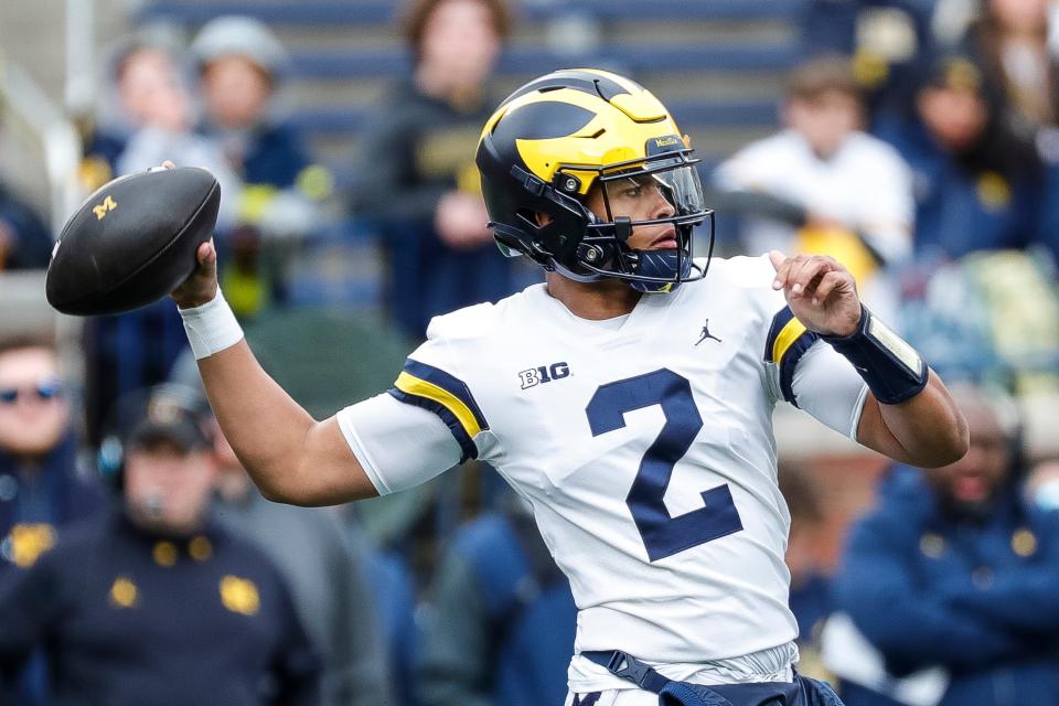 Maize Team quarterbacks Jadyn Davis makes a pass against Blue Team during the first half of spring game at Michigan Stadium in Ann Arbor on Saturday, April 20, 2024.