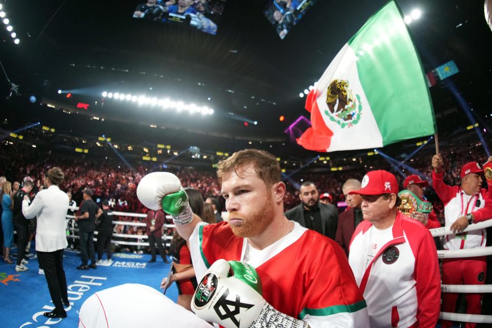 Sep 17, 2022; Las Vegas, Nevada, USA; Canelo Alvarez (red trunks) and Gennadiy Golovkin (white trunks) box during a middleweight championship bout at T-Mobile Arena. Mandatory Credit: Joe Camporeale-USA TODAY Sports