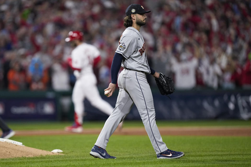 Philadelphia Phillies' Bryce Harper rounds the bases after a two-run home run hit off Houston Astros starting pitcher Lance McCullers Jr. during the first inning in Game 3 of baseball's World Series between the Houston Astros and the Philadelphia Phillies on Tuesday, Nov. 1, 2022, in Philadelphia. (AP Photo/David J. Phillip)