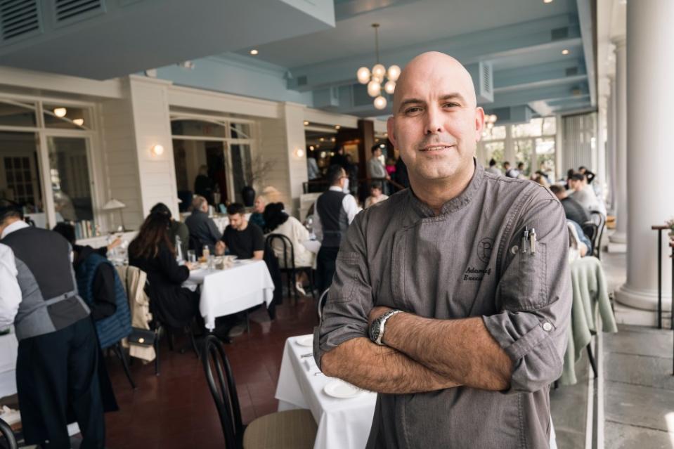 Adam Fiscus is executive chef at the restaurant, where the ceiling has been painted a childish blue color. Stefano Giovannini