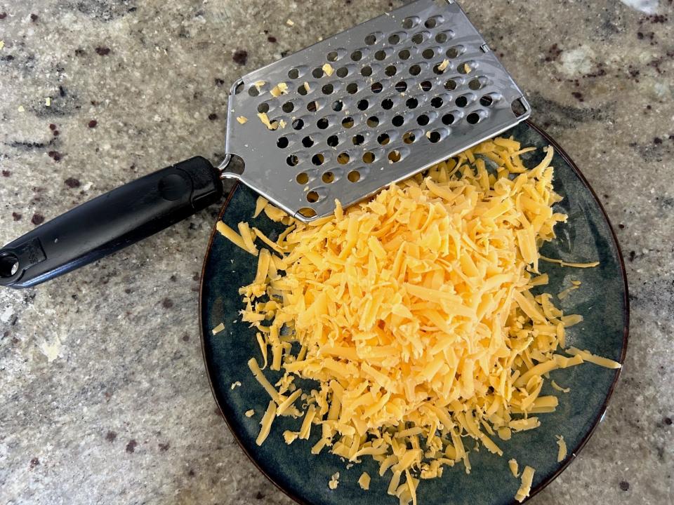 Grating cheese for Gordon Ramsay's 10-minute omelette