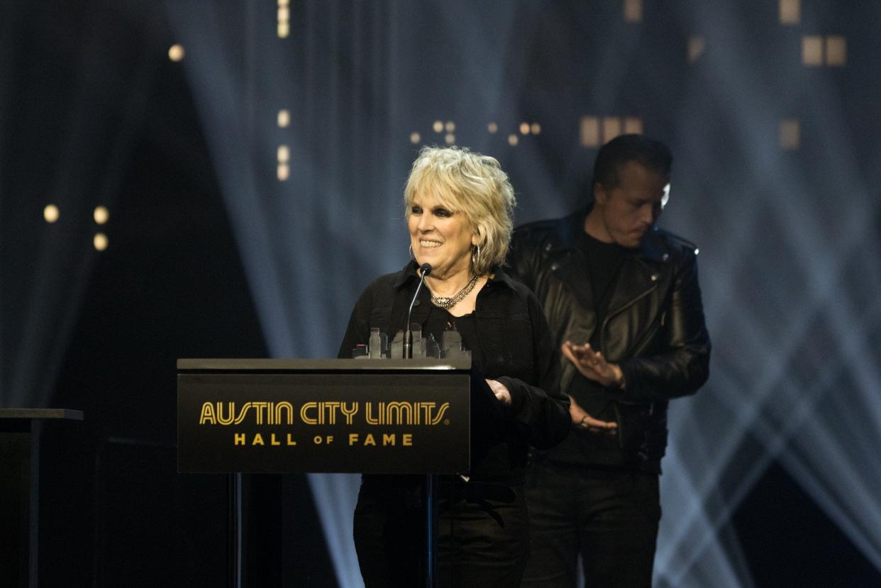 Lucinda Williams accepts her induction into the "Austin City Limits" Hall of Fame in 2022. Williams will play ACL Live on Jan. 19.