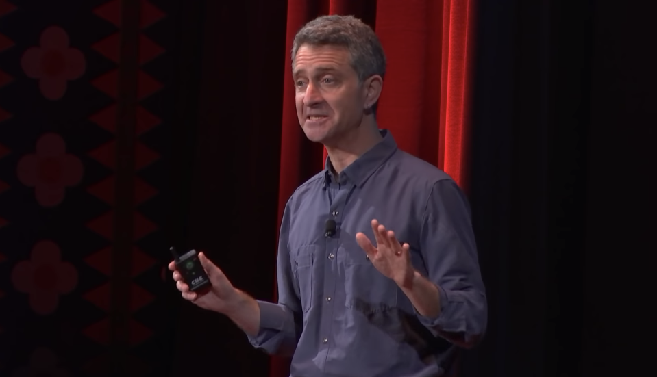 Picture of Vince Beiser, giving a Ted Talk at University of Pennsylvania about the global sand crisis, titled "There's a global sand crisis and no one is talking about it"