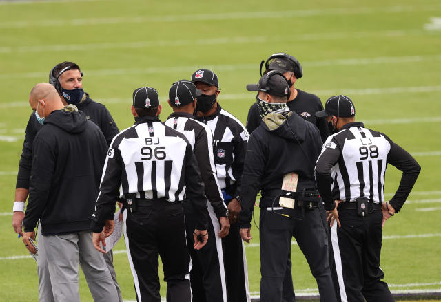 Ravens celebrate on Titans logo, get flagged for taunting after