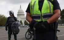 Demonstrators rally in support of January 6 defendants at protest near the U.S. Capitol in Washington