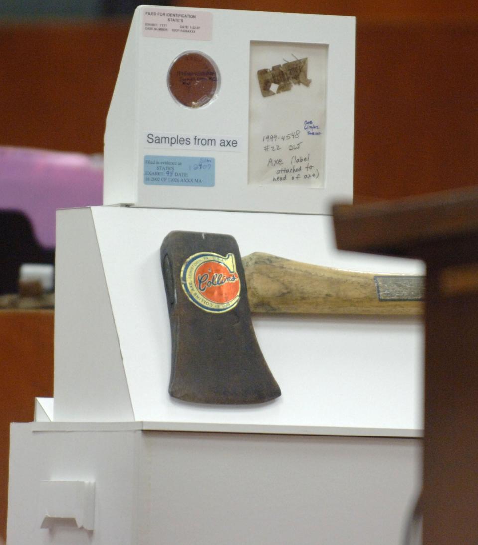 The murder weapon, an ax, is displayed during the 2007 sentencing phase at Jason Andrew Simpson's trial in the Duval County Courthouse.