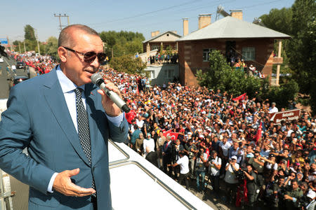 Turkish President Tayyip Erdogan addresses his supporters in the eastern city of Bitlis, Turkey August 26, 2018. Murat Cetinmuhurdar/Presidential Palace/Handout via REUTERS