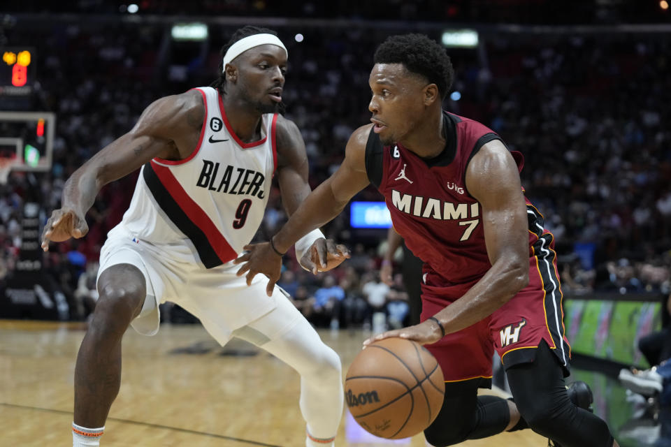 Miami Heat guard Kyle Lowry (7) drives to the basket against Portland Trail Blazers forward Jerami Grant (9) during the second half of an NBA basketball game, Monday, Nov. 7, 2022, in Miami. (AP Photo/Wilfredo Lee)