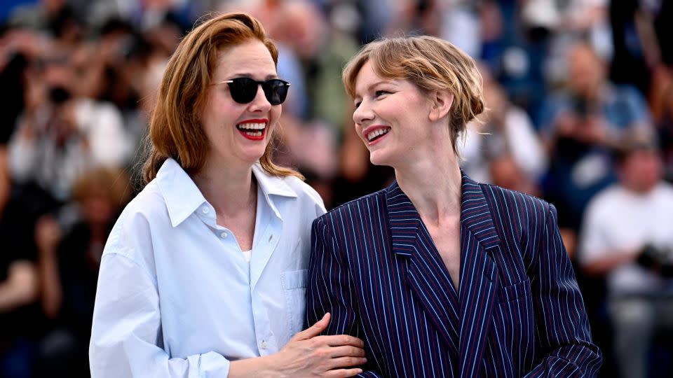 Director Justine Triet and actor Sandra Hüller at the Cannes Film Festival on May 22, 2023. Their film "Anatomy of a Fall" was awarded the Palme d'Or, the festival's highest prize. - Gareth Cattermole/Getty Images Europe/Getty Images