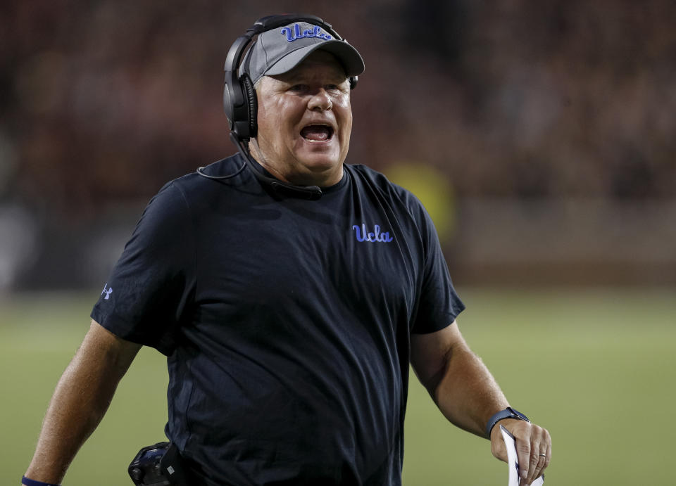 UCLA coach Chip Kelly yells to his team during Thursday's game against the Cincinnati Bearcats. (Getty)