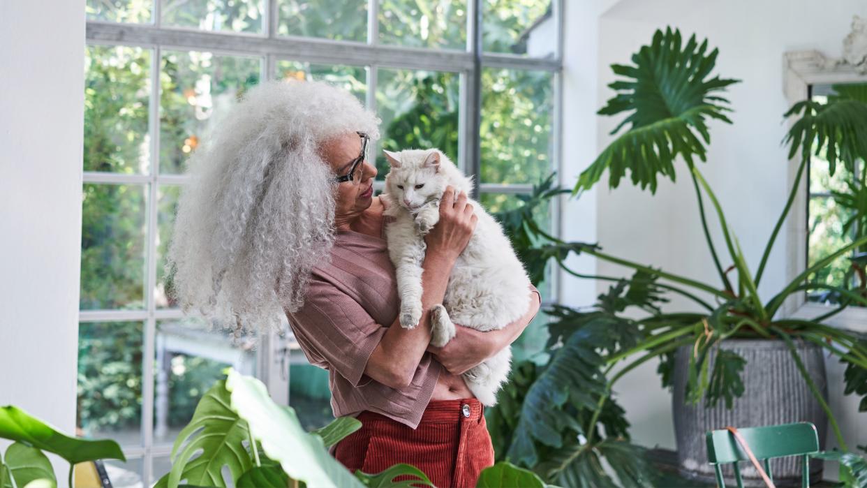 Woman holding cat