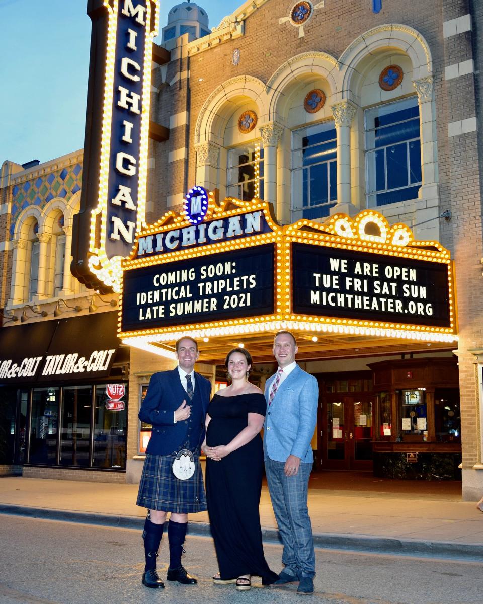 From left, Kevin O'Neill, Maureen Farris and Eric Portenga, celebrated the announcement of the triplets Farris was carrying in a special way. Farris was the surrogate for the triplets.