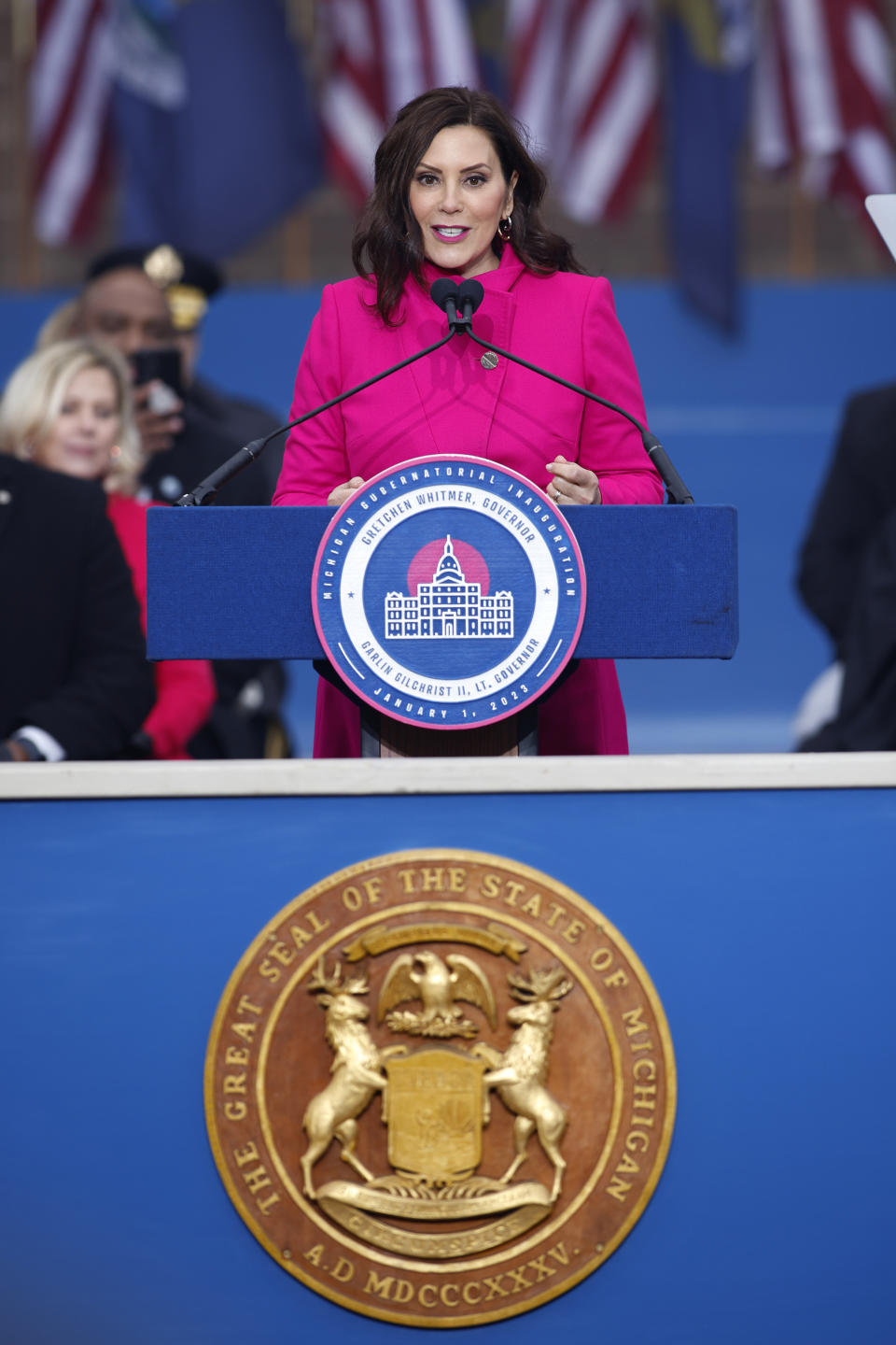 Michigan Gov. Gretchen Whitmer addresses the crowd during inauguration ceremonies, Sunday, Jan. 1, 2023, outside the state Capitol in Lansing, Mich. (AP Photo/Al Goldis)