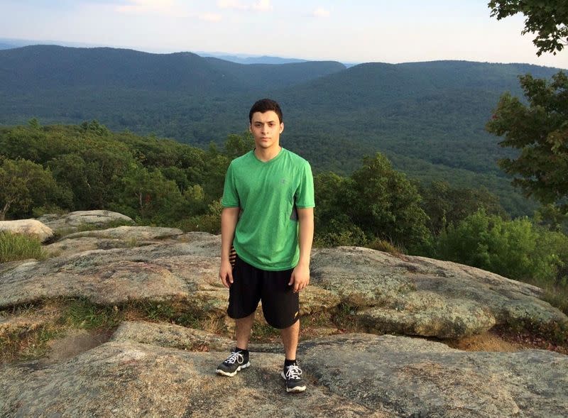 ldA handout picture shows Egyptian-American medical student Mohamed Amashah posing for a photo in New York