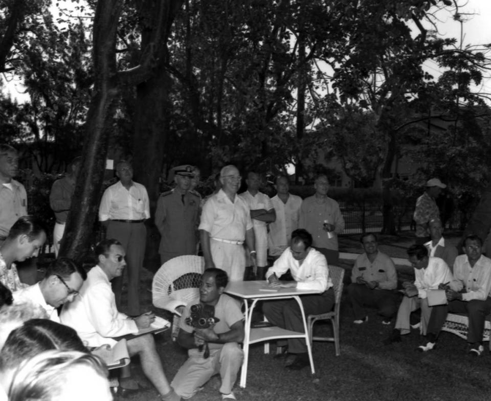 President Harry S. Truman held a press conference on the west lawn of The Little White House in Key West, Florida, on March 18, 1949. Press Secretary Charles Ross is far left.