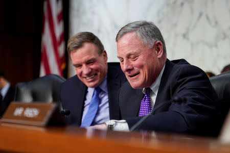 Chairman of the Senate Intelligence Committee Richard Burr (R-NC) and vice-chairman Mark Warner (D-VA) prepare for a hearing about "worldwide threats" on Capitol Hill in Washington, U.S., January 29, 2019. REUTERS/Joshua Roberts