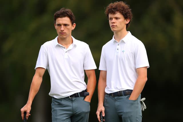 <p>Andrew Redington/Getty</p> Tom Holland and Harry Holland look on during the Pro-Am prior to the BMW PGA Championship at Wentworth Golf Club on September 13, 2023 in Virginia Water, England.