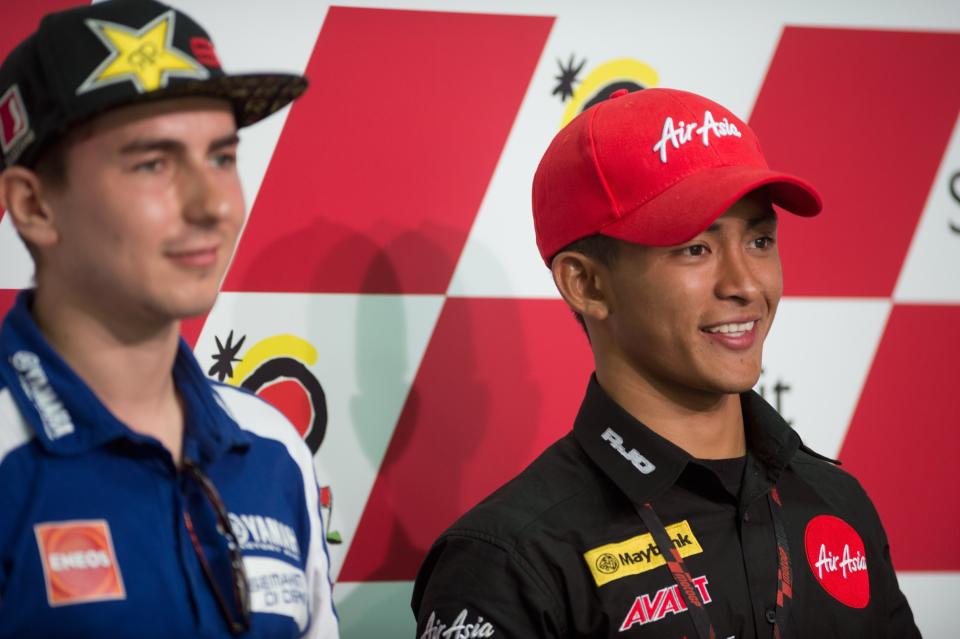 KUALA LUMPUR, MALAYSIA - OCTOBER 20: Muhammad Zulfahmi Khairuddin of Malaysia and Air Asia-SIC-Ajo poses and celebrates his first Pole Position in Moto3 during the press conference at the end of the qualifying practice of the MotoGP Of Malaysia at Sepang Circuit on October 20, 2012 in Kuala Lumpur, Malaysia. (Photo by Mirco Lazzari gp/Getty Images)