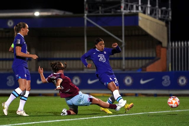 Chelsea’s Sam Kerr (right) scores against West Ham