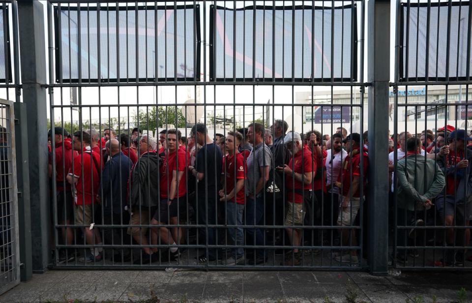 Fans gathered at the perimeter of the Stade de France ahead of the Champions League final in Paris (Nick Potts/PA) (PA Wire)