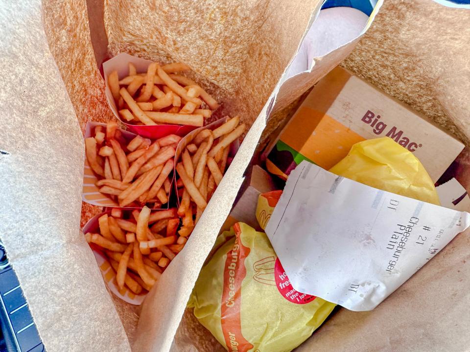 Bag of McDonald's fries and bag of burgers and nug