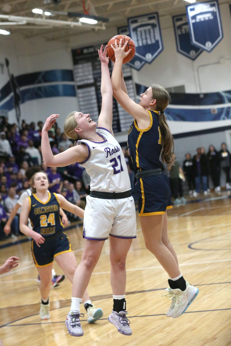 Ross' Abby Cahill fights for a rebound.