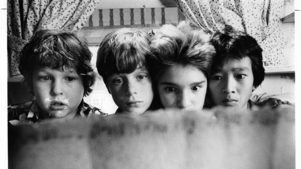 Jeff Cohen, Sean Astin, Corey Feldman and Ke Huy Quan in a scene from the film 'Goonies', 1985