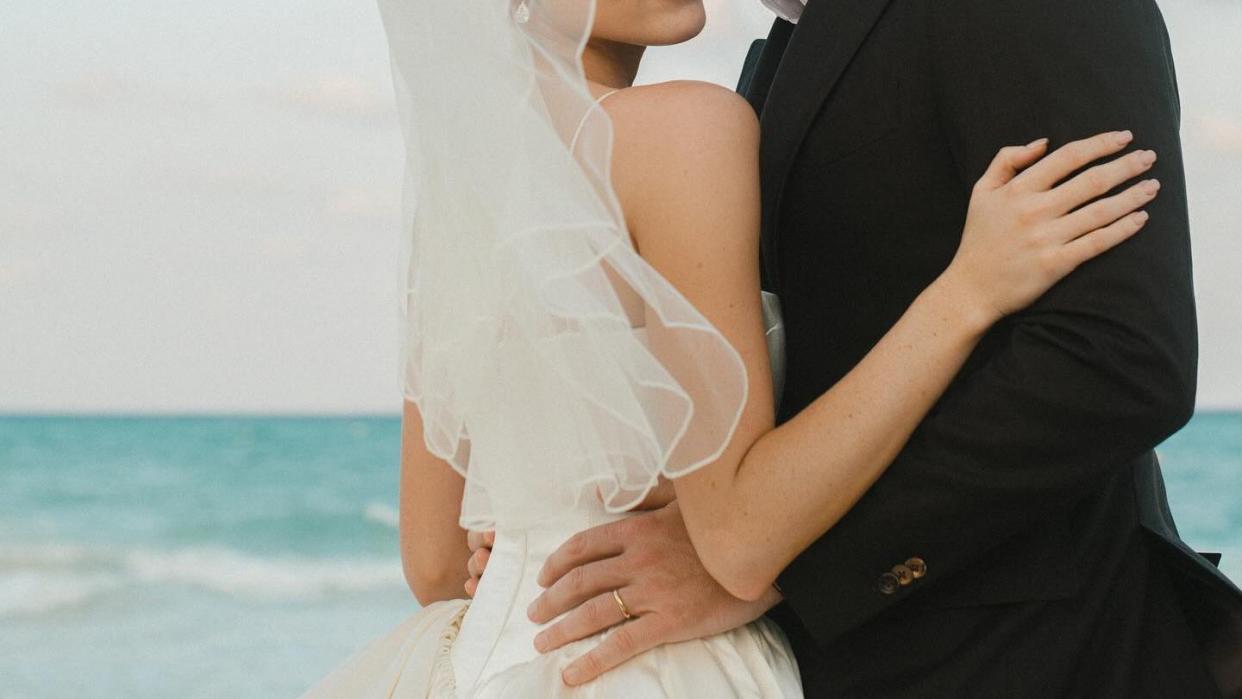 a man and woman posing for a picture