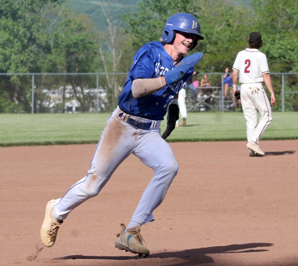 Horseheads' Jackson Cook rounds third base as the Blue Raiders completed a two-game sweep of Elmira in the Section 4 Class AA baseball championship series with a 13-7 win May 25, 2022 at Ernie Davis Academy.