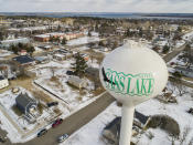 An aerial view of Cass Lake, Minn., Sunday, Nov. 21, 2021. Cass Lake has a population of 753 as of 2018 and is on the Leech Lake Indian Reservation. (AP Photo/Jack Rendulich)