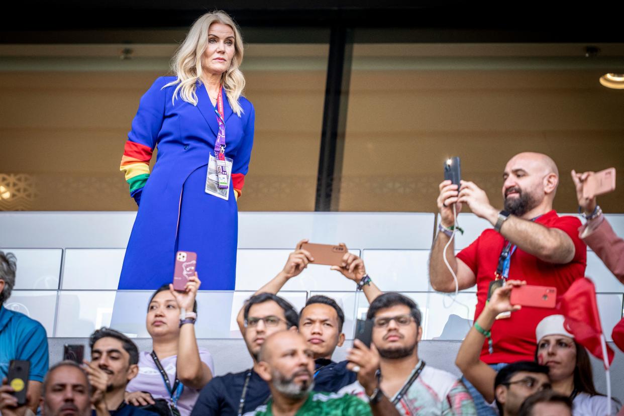 Former danish prime Minister Helle Thorning-Schmidt wears a rainbow coloured sleeves on her outfit during the  Qatar 2022 World Cup Group D football match between Denmark and Tunisia at the Education City Stadium in Al-Rayyan, west of Doha on November 22, 2022. - Denmark OUT (Photo by Mads Claus Rasmussen / Ritzau Scanpix / AFP) / Denmark OUT (Photo by MADS CLAUS RASMUSSEN/Ritzau Scanpix/AFP via Getty Images)