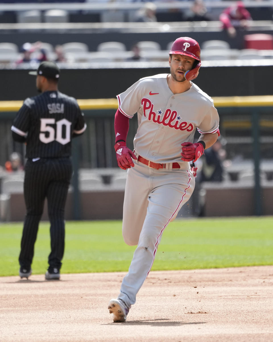 Philadelphia Phillies' Trea Turner rounds the bases after hitting a home run off Chicago White Sox starting pitcher Mike Clevinger, during the first inning of a baseball game Wednesday, April 19, 2023, in Chicago. (AP Photo/Charles Rex Arbogast)