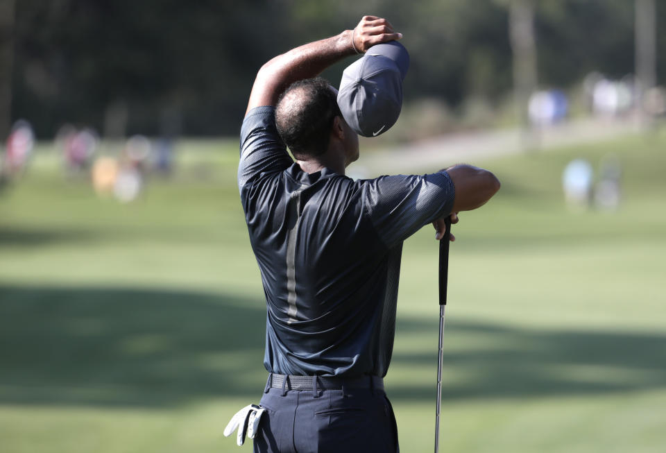 Tiger Woods wipes his face during the second round of the Players Championship golf tournament. (AP)