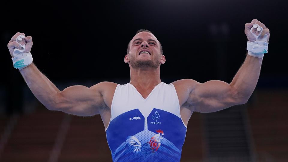 Samir Ait Said of France celebrates after performing on the rings Saturday.