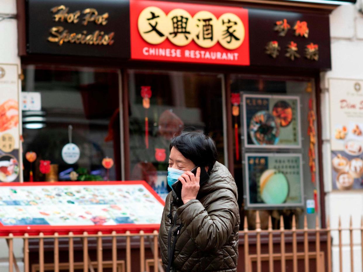 Chinese-owned businesses have taken a hit since coronavirus began spreading worldwide, casting suspicion and fear on Asian communities: AFP via Getty Images