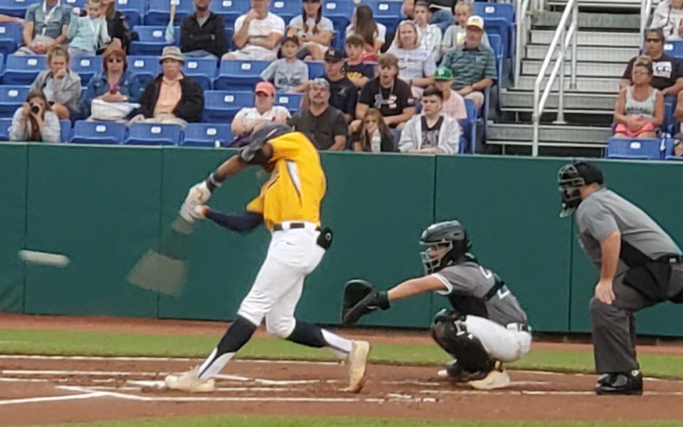 Christian Moore connects on a pitch and hits a first inning home run for the Midland (OH) Baseball Team in a pool play game of the Connie Mack World Series Tournament, Saturday, July 24, 2021 at Ricketts Park.