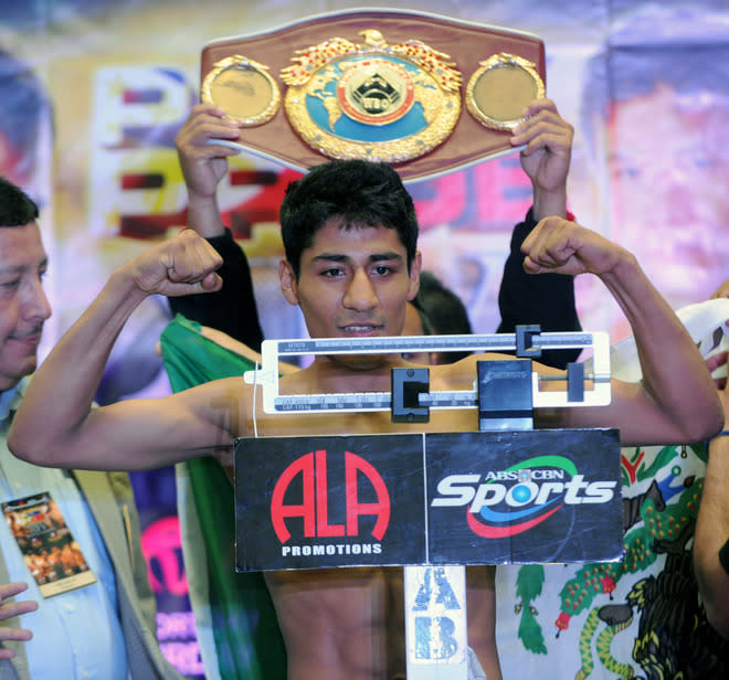 Mexican Light-flyweight Boxer Felipe Salguero Flexes AFP/Getty Images